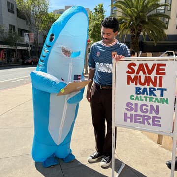 Cover Image for Signature Gathering at Car-Free Telegraph Rally