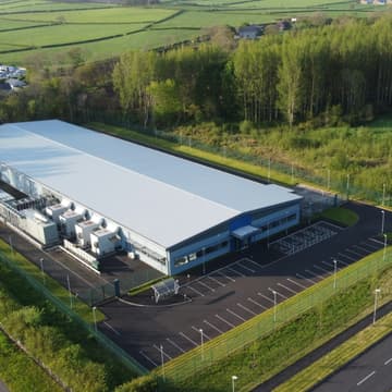 Cover Image for Aligning AI Data Centers with Sustainable Solutions for Grid Efficiency