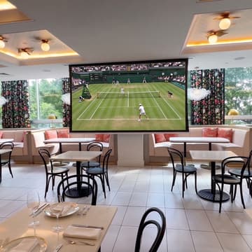 Cover Image for Where to Watch Wimbledon in Miami: A Tennis Social. Caviar, bottomless bubbles, and the Gentlemen's Final