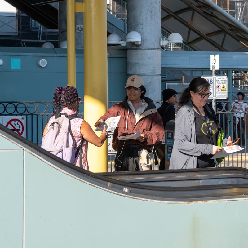 Cover Image for Flyering to Stop State Cuts to Affordable Housing & Public Transit @ Downtown Alameda Art & Wine Faire