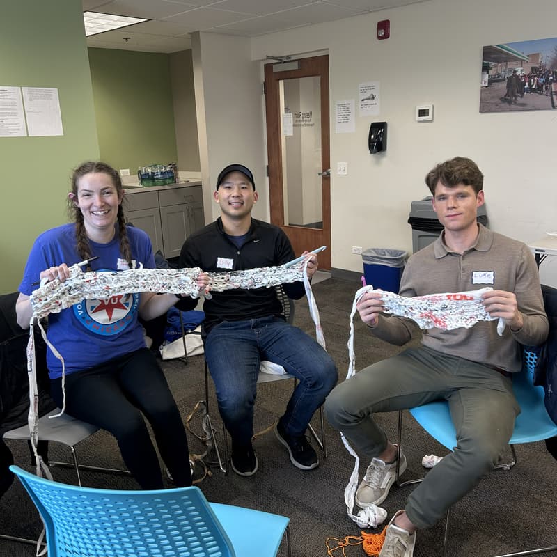 Cover Image for Volunteer with Bags and Mats (Volunteering Untapped Chicago)